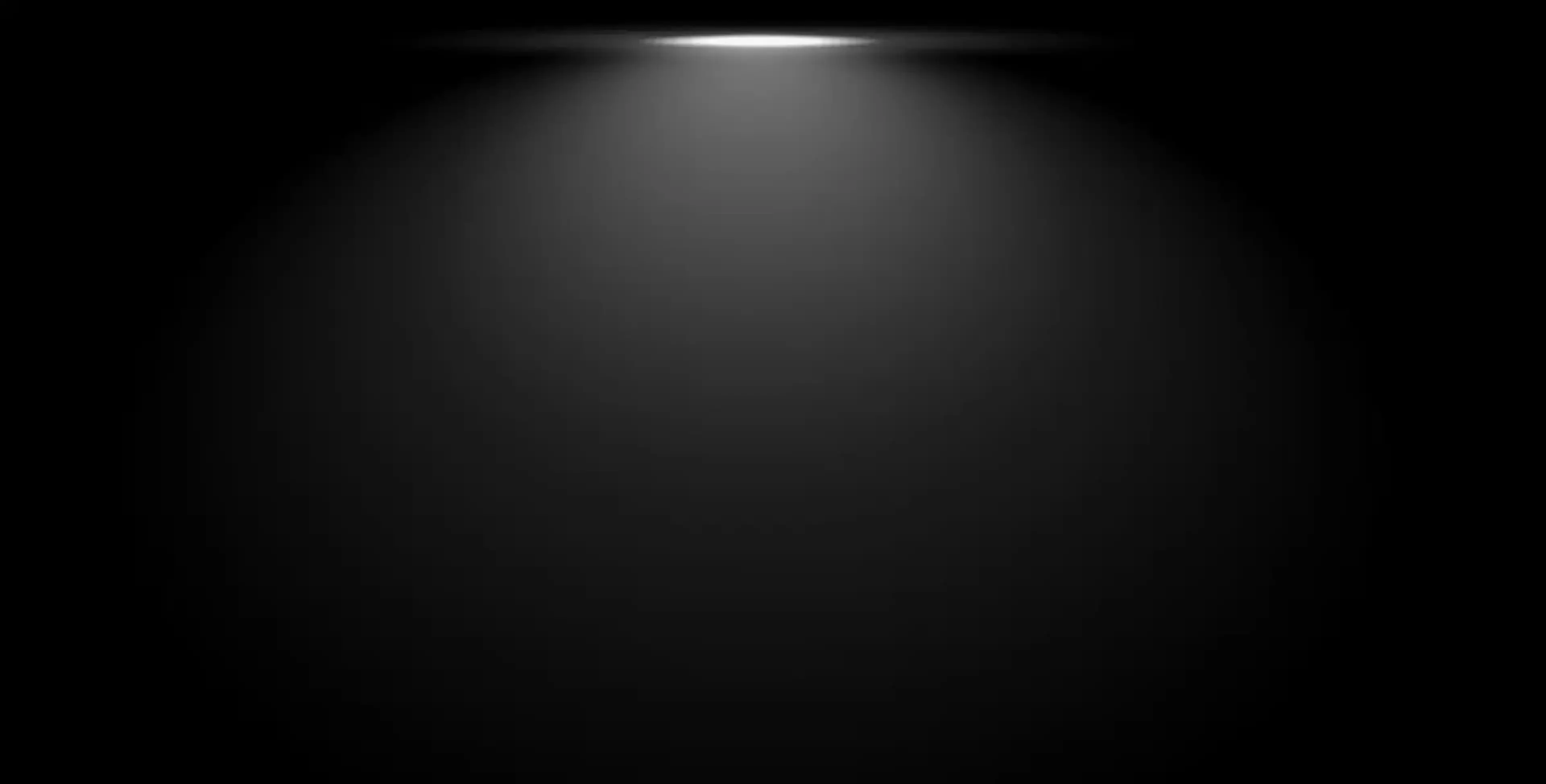 Dark background with spotlight at the top.